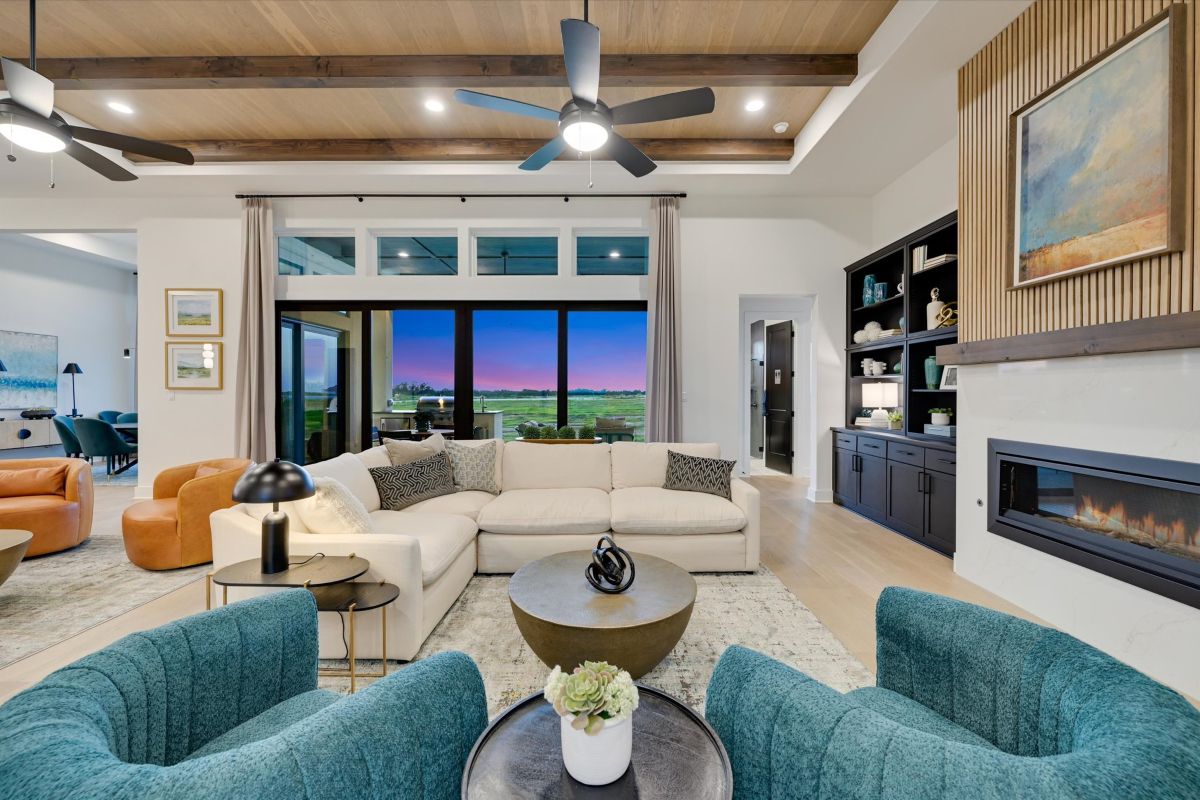 Modern living room in an open space setting designed by Giddens Homes located in Leander, TX.